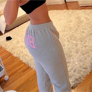 Body! By Raven Tracy back shot sweats- runs small. Pink/gray color